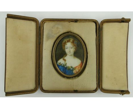 Portrait miniature of a 19th century lady
in oval gilt frame and leather case, height 4.75" overall.