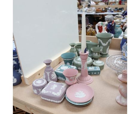 A collection of Wedgwood green and pink Jasperware items, tallest vase 15.5cm.The green Wedgewood tapered vase has a chip alo