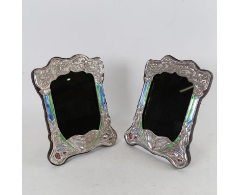 A pair of Art Nouveau style Continental silver and enamel-fronted strut photo frames, overall height 12cm, internal dimension