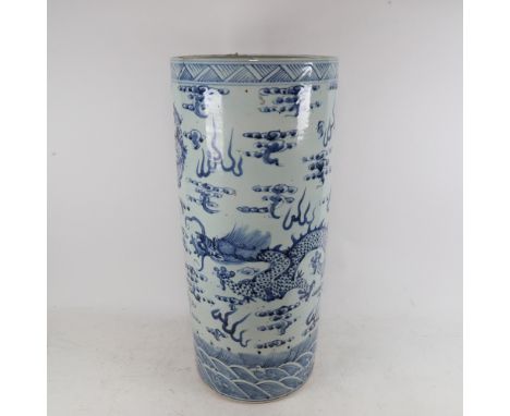 A large Chinese blue and white ceramic stick stand, with dragon decoration, height 62cm 