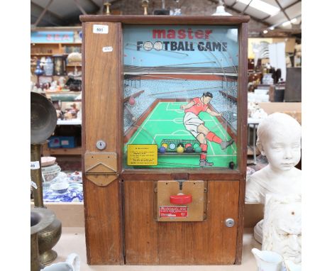 A Vintage Master Football Game, coin-in-the-slot mechanism, Mastermatic REGD The Master Vending Machine Co Ltd, with 5 colour