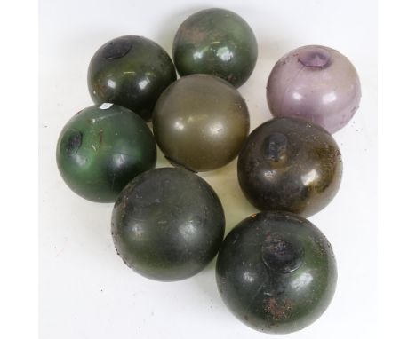 8 coloured glass orbs, diameter 13cm (8).&nbsp;Seven of the orbs are similar in design with applied stopper. One seems slight