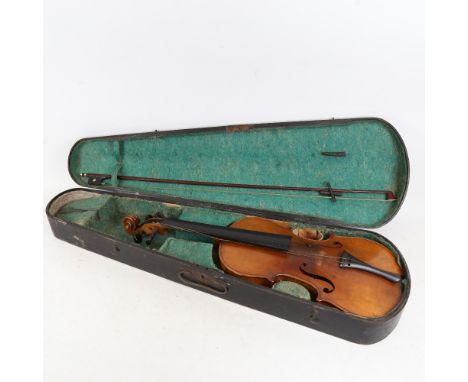 An early 20th century Stradivarius copy violin and bow, violin length 60cm, in hardshell case 