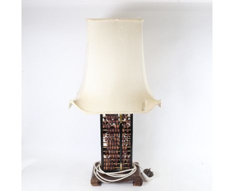 A 2-sided abacus table lamp, height excluding shade 60cm 