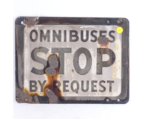 A white and black enamel double-sided sign "Omnibuses stop by request", length 34cm, height 25cm 