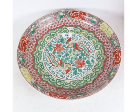 An Oriental charger with phoenix decoration, diameter 37cm.&nbsp;The charger dish is in good condition with just some light s
