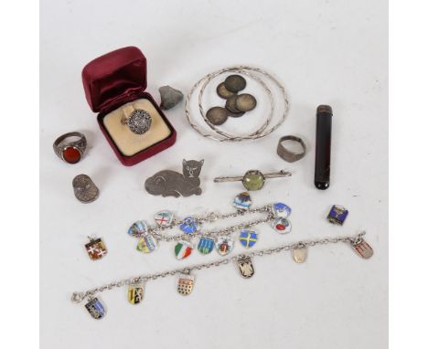 Various silver jewellery, including enamel charm bracelet, carnelian seal ring, cat brooch, slave bangles etc 