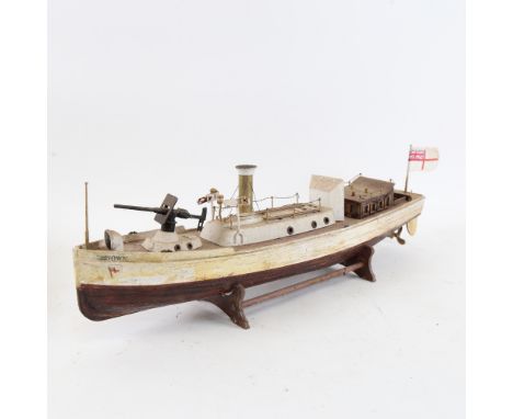 A handmade painted wooden-hulled steam gunship, hull length 44cm, on wood stand. This is just a model boat with no motor.&nbs