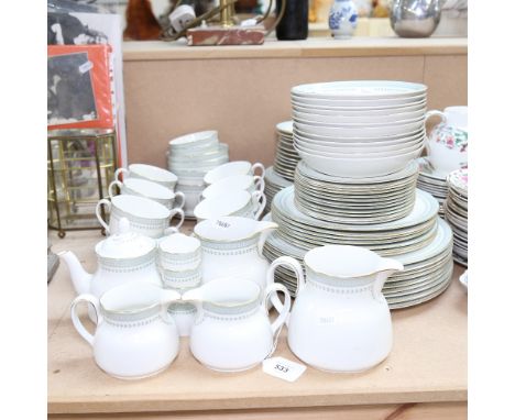 A Royal Doulton Berkshire pattern tea and dinner service, including dinner plates, tea cups, sauce jugs, egg cups etc, larges