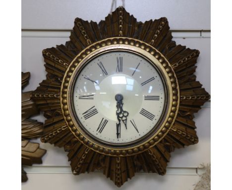 A Vintage Smiths gilded electric wall clock, 24cm diameter 