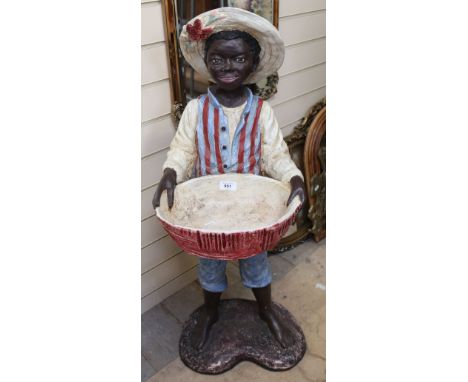 A Vintage composition Blackamoor boy figure holding a bowl, height 95cm 