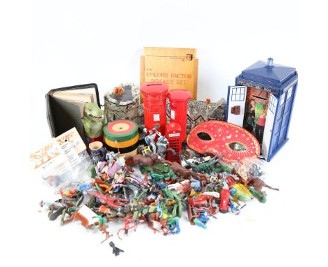 A model church, a leather-bound photograph album, novelty money boxes, plastic figures etc 