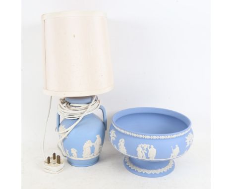 A Wedgwood blue and white Jasperware pedestal bowl, diameter 20cm, and lamp, height 38cm.Bowl is in good condition no chips o