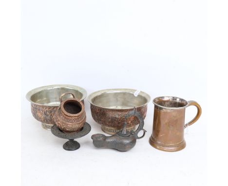 A pair of Middle Eastern copper-mounted nut bowls, a small copper salt pot, oil lamp etc 