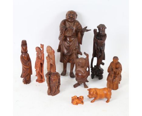 Various Oriental carved wood figures, including pig netsuke, Japanese musician, Shou Lao, largest height 16.5cm (10). The tal