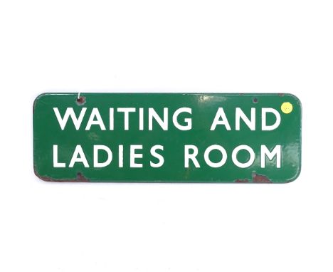 A vintage railway green and white enamel "Waiting and Ladies Room" 
