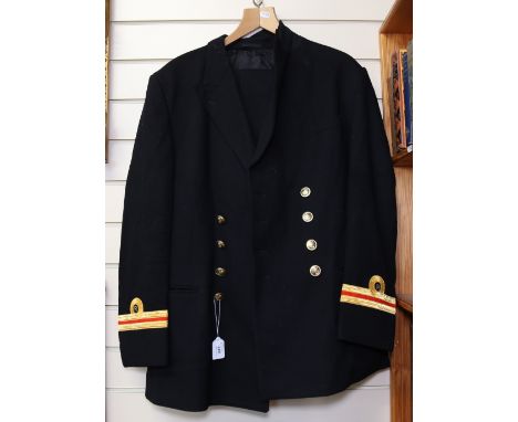 A Vintage Royal Navy uniform jacket and trousers 