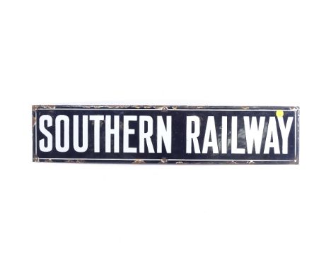 A vintage black and white enamel Southern Railway sign, length 68cm 
