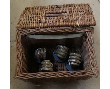 4 wall light brackets in the form of a hand, and a wicker basket 