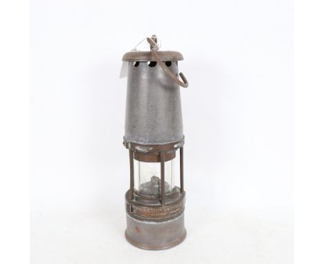 A miner's lamp by The Wolf Safety Lamp Co (WM Maurice) Ltd Sheffield 