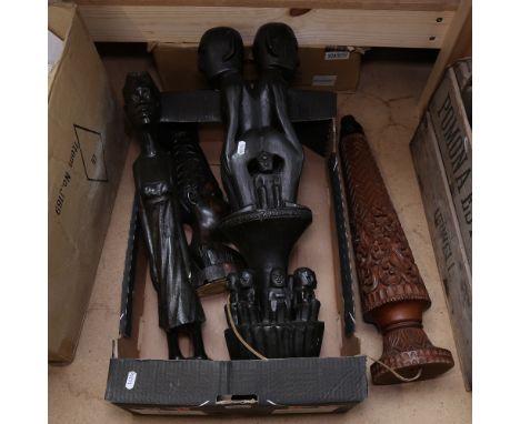 A group of African Tribal hardwood carvings, including totem and table lamp, largest height 70cm (4) 