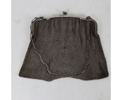 A French Art Deco silver evening bag/purse, chainmail body with cast frame and cable link handle, import hallmarks London 191