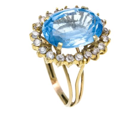 Ring GG 585/000 mit einem oval fac. blauen Schmuckstein 18 x 13 mm und 21 rund fac. weißen Schmucksteinen 2 mm, RG 61, 9,8 g