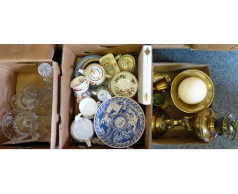A brass oil lamp with cherub support, an ostrich egg together with various china and glassware