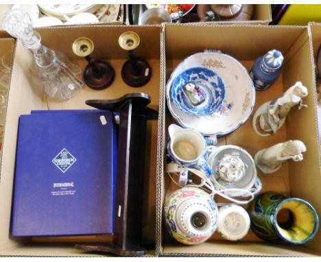 A pair of wooden barley twist candlesticks, a decanter, various Edinburgh crystal glasses, boxed, a Poole table lamp and othe