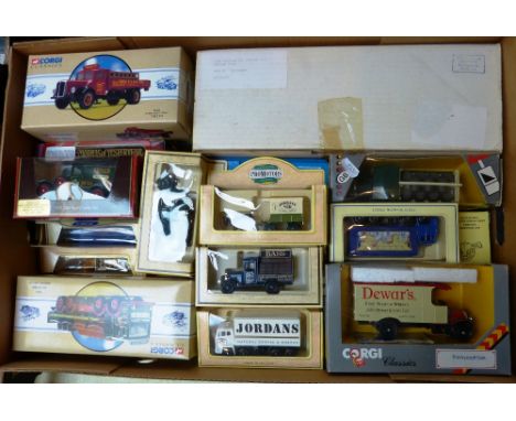 A box of Corgi and other die-cast models, relating to the breweries