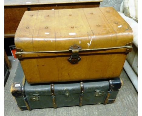 A tin trunk, containing games and jigsaw together with a travelling trunk