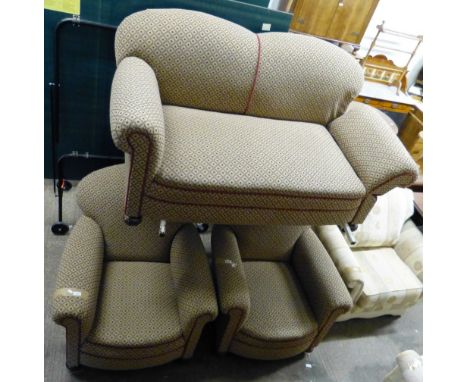 A re-upholstered early 20th century three-piece suite, the two-seater sofa with drop arm together with two armchairs