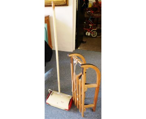 A wooden sledge, together with a Ewbank Elite carpet sweeper (2)