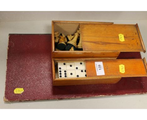 A SET OF DOMINOES, CHESS SET & PLAYING BOARD