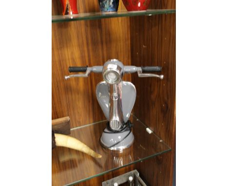 A LARGE METAL VESPA LAMP