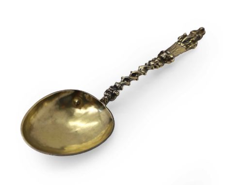 A Dutch silver gilt birth spoon, probably 18th century,the bowl with engraved text verso, on an entwined handle with mother a