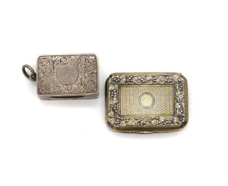 A silver vinaigrette by George Nathan &amp; Ridley Hayes, Chester 1901, 3.5cm wide,together with a another example,with engin