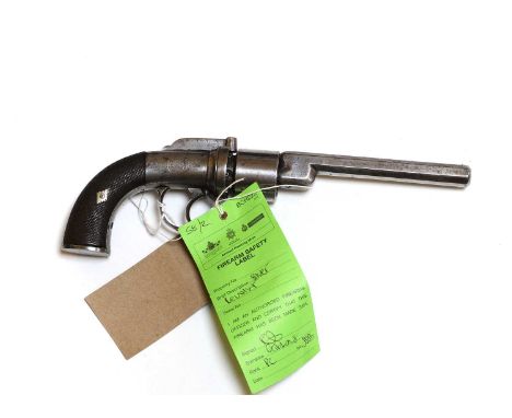 A transitional six shot revolver, English by Manton, Londonwith chequered walnut grip14cm barrelProvenance : from the estate 