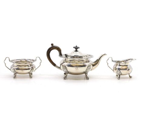 A silver three-piece bachelors tea set, by Charles Edward Nixon, Sheffield, 1899, each piece initialled, teapot, 12cm high, 2