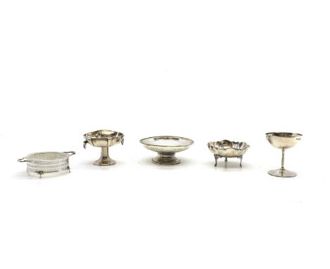 A collection of silver items, variously dated, comprising, a champagne goblet, 9.3cm high, two pierced bowls, largest 14.2cm 