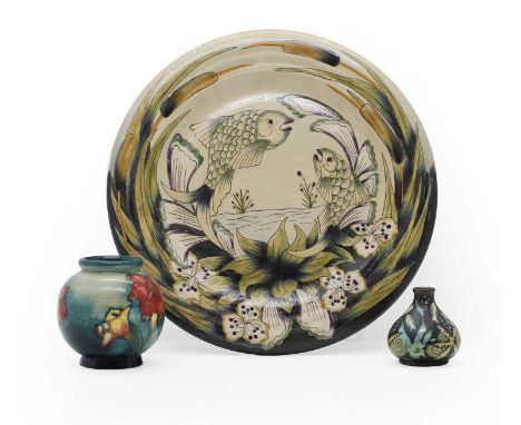 A Moorcroft Clematis vase, 20th century, of bulbous form with green glazeimpressed marks with Queen Mary label,13cm hightoget