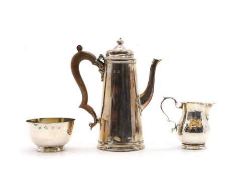 A silver three piece coffee service London 1978,comprising coffee jug, sugar bowl and cream jug,23cm height of coffee pot,app