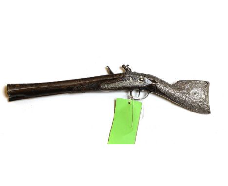 A flintlock blunderbuss pistol Turkish, 19th centurythe swamper barrel signed and profusely inlaid with yellow and white meta