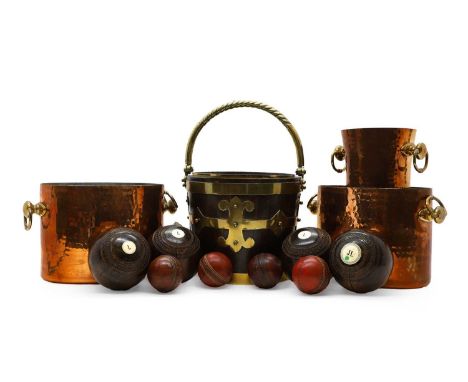 A Victorian bucket,  with a spiral twist handle, 40cm high, three French copper wine coolers, 33cm and 21.5cm wide, a collect