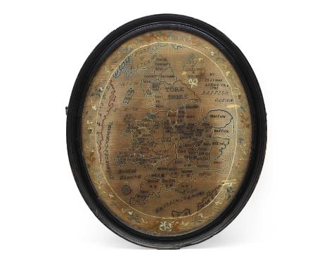 A needlework map of Britain 19th centurythe oval map set in an ebonised frame52 x 42cmCondition Reporttears and discoluration