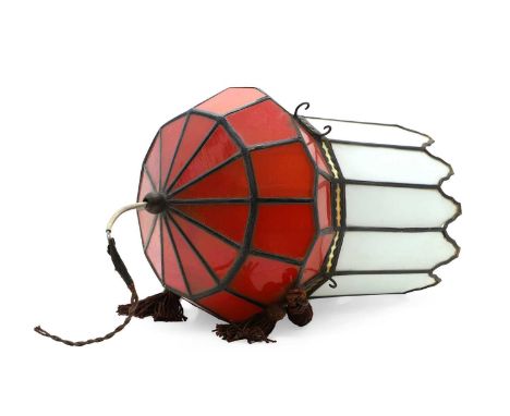 A leaded glass lantern or theatre light, 20th century, possibly French, with opaque glass in red and white, 45cm highConditio