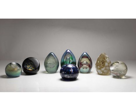 A collection of Okra studio glass paperweights c.1980, comprising a cameo glass example by Sarah Cowan, three spire form pape