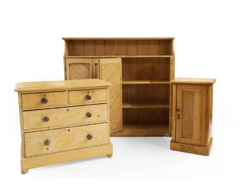 A pine cabinet, with two chevron panelled cupboards, 143cm wide 33cm deep129cm high, a chest of drawers,89cm wide 49cm deep79