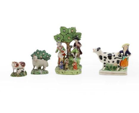 A group of Staffordshire pottery figures, 19th century, comprising a flat back example, a lady and a gentleman, with anthropo