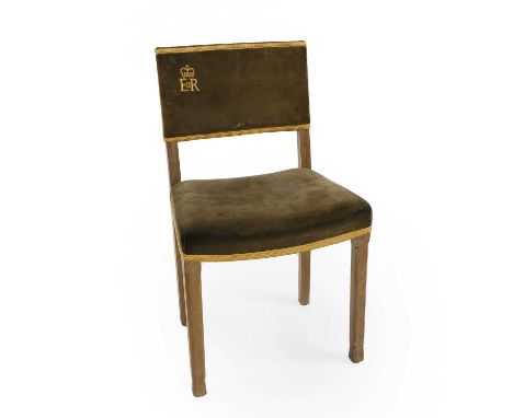A Queen Elizabeth II silvered oak coronation chair, mid-20th century, with blue velvet upholstery, labelled '134' to the top 